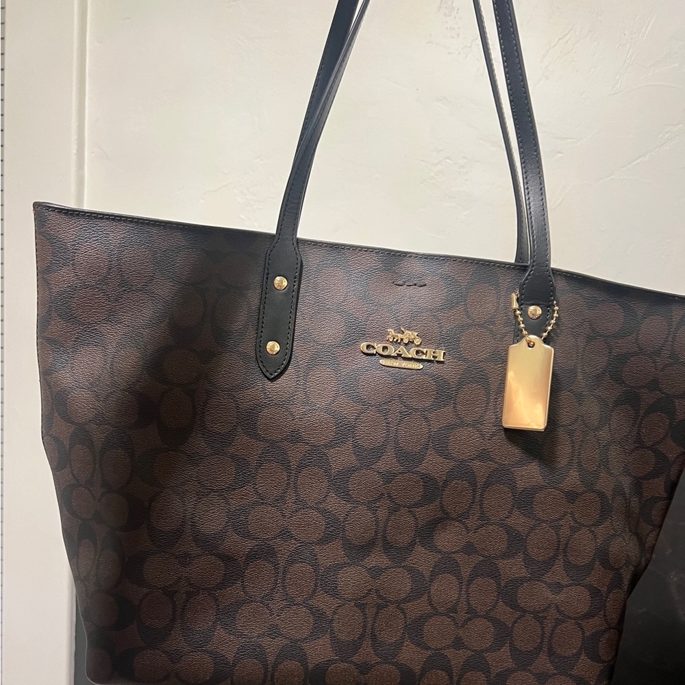 Authentic Coach purse. Bought from outlet mall and never used. Medium sized
